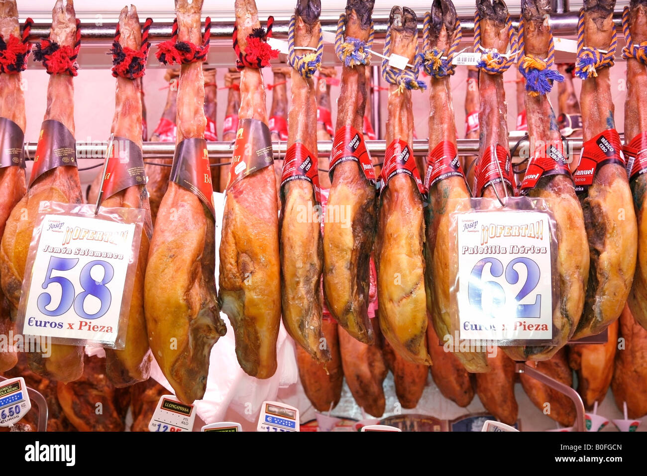 Ham for sale La Boqueria Market Barcelona Catalonia Spain Stock Photo