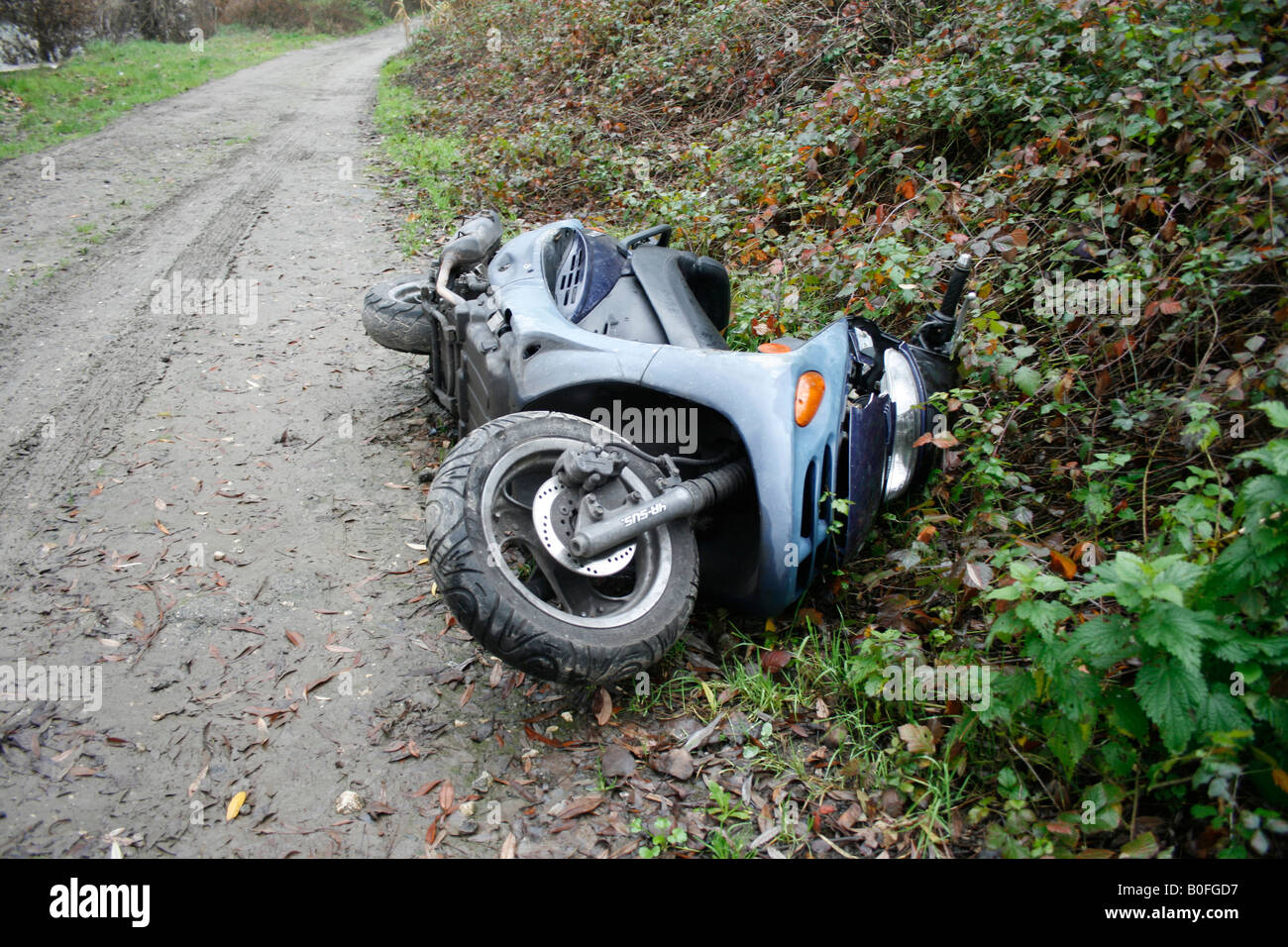 scooter moped motorbike abandoned on rural country path lane Stock ...
