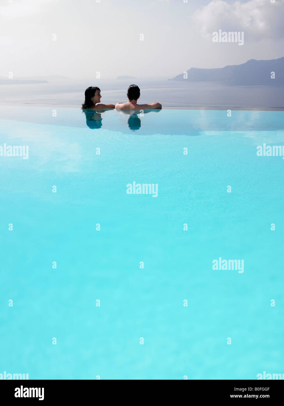 Couple in swimming pool Stock Photo