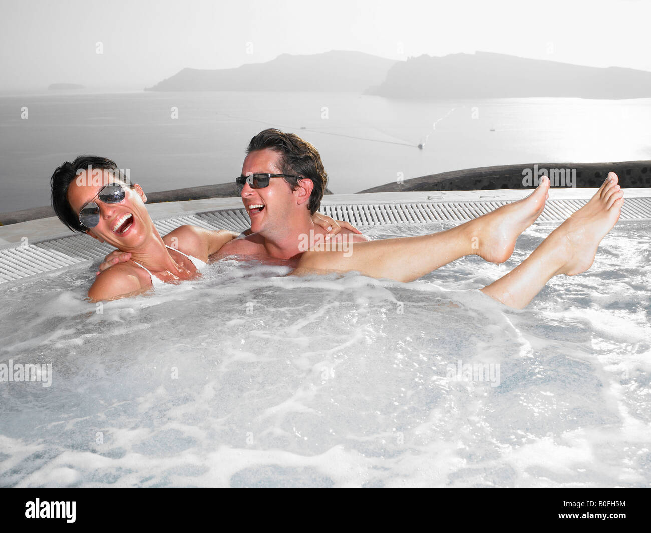 Couple in hot tub Stock Photo