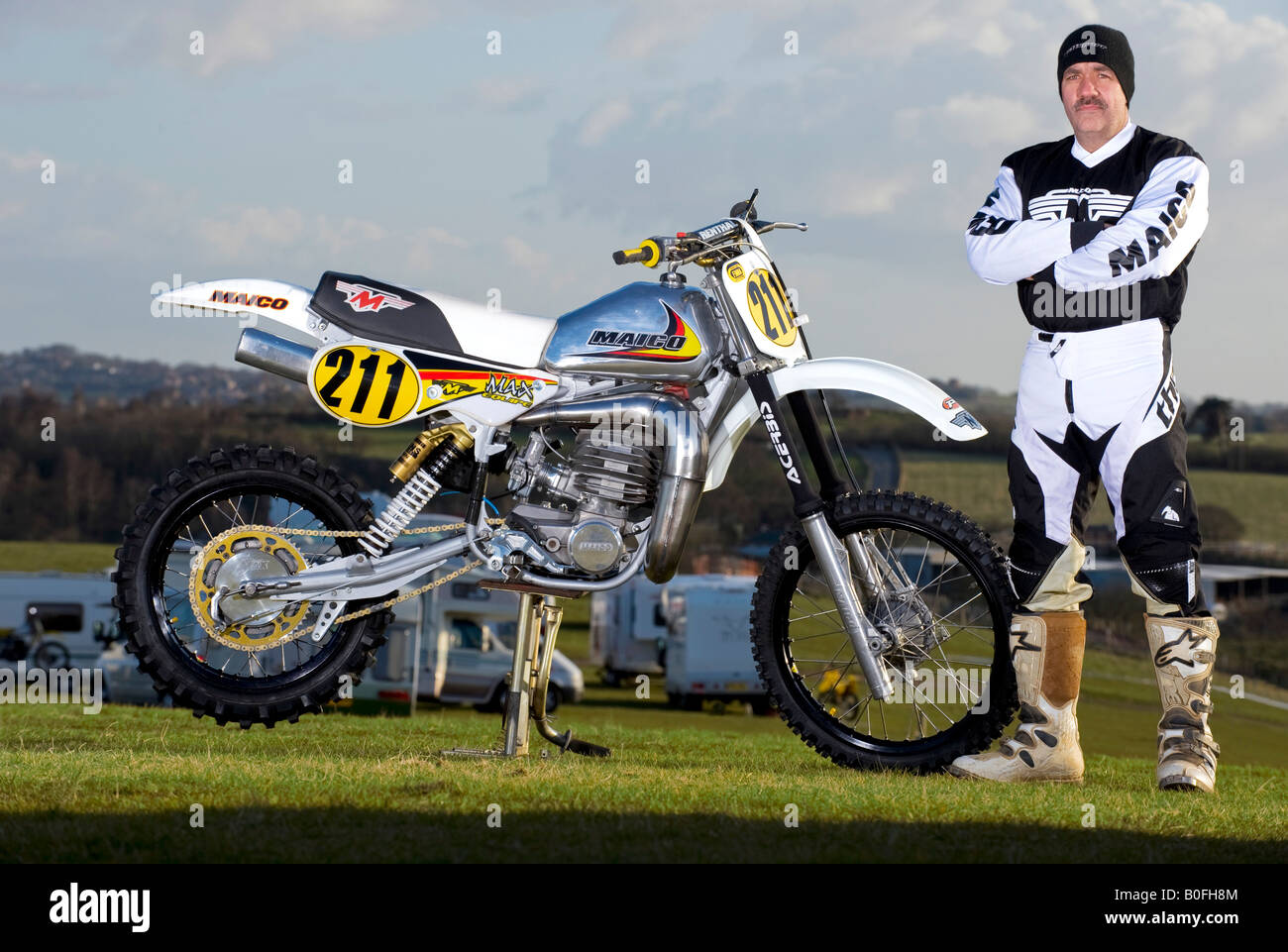 Twin shock vintage motocross rider MX dirt muddy with knobbly tyres ...