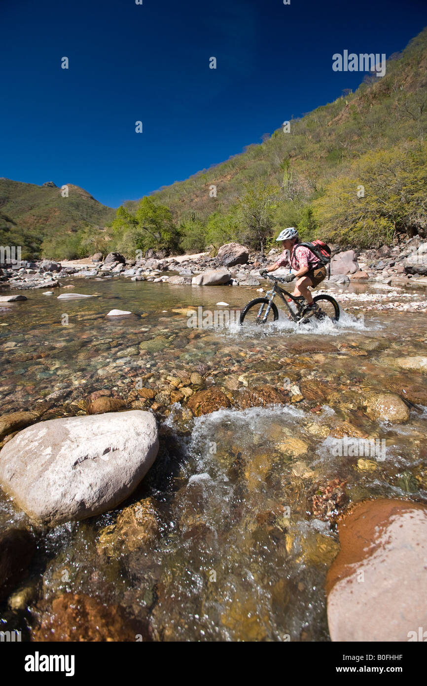 Rachel Schmidt mountain biking from Cerro Colorado to Batopilas in the Copper Canyon area of