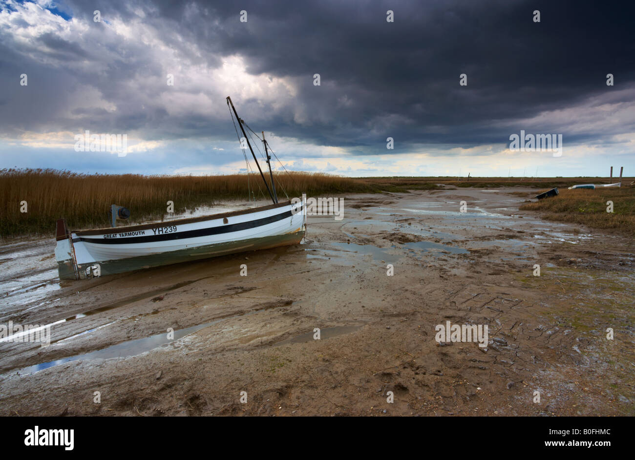 A moody spring afternoon at Brancaster Staithe on the North Norfolk Coast Stock Photo