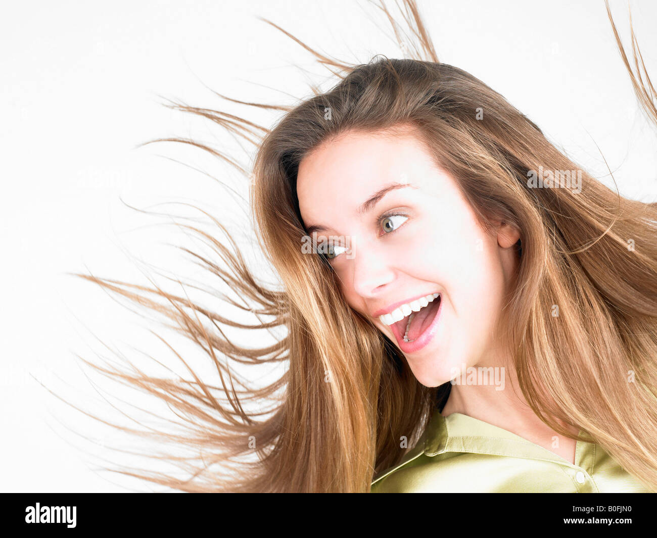 Woman smiling, on the move Stock Photo
