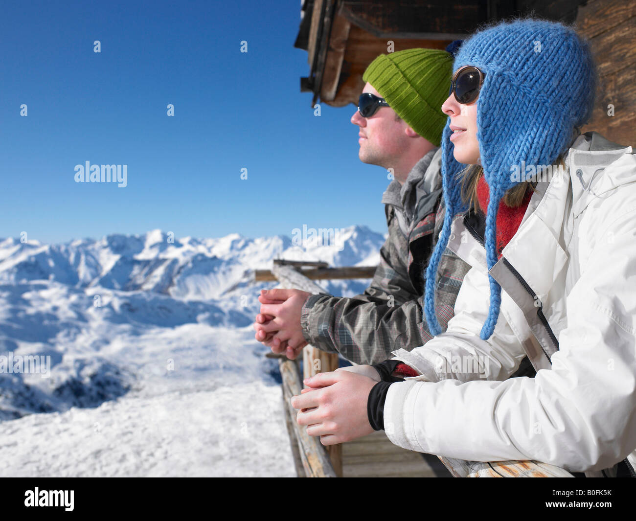 Couple admiring mountain view Stock Photo