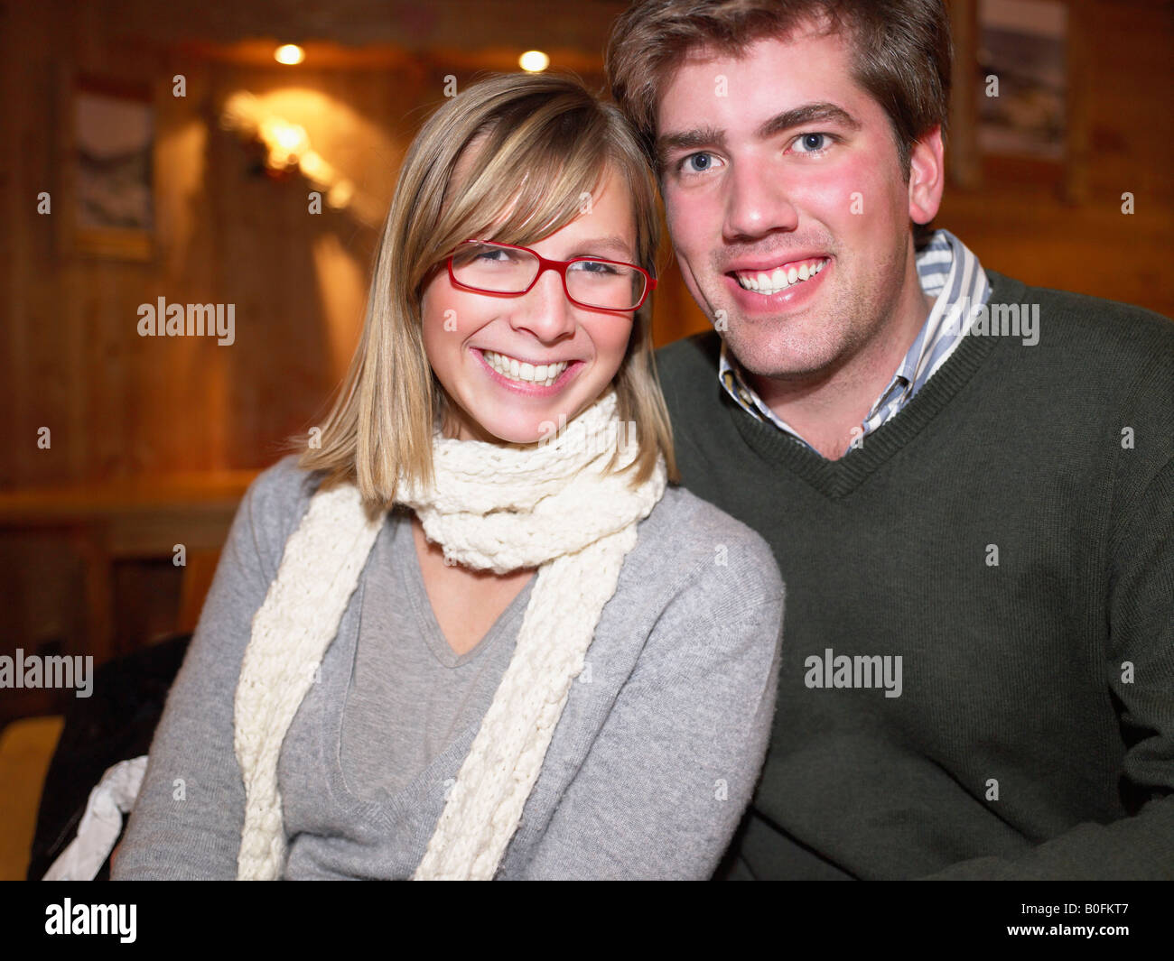 Smiling couple in restaurant Stock Photo