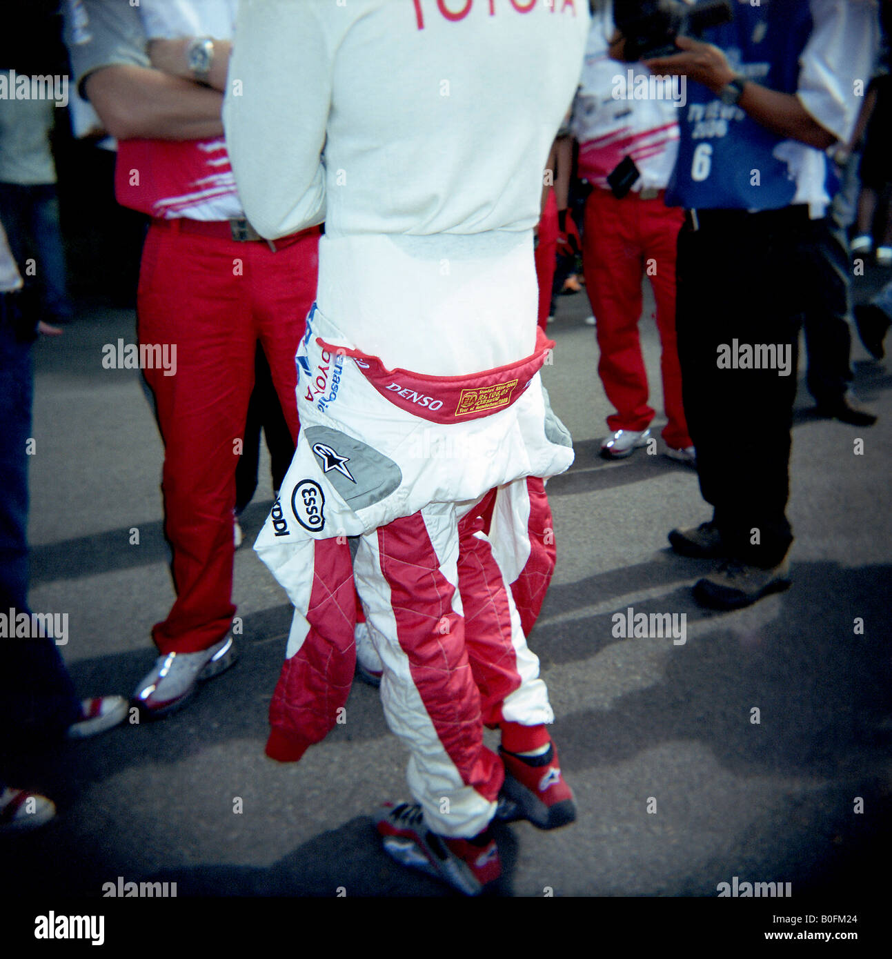 Toyota Formula One driver Olivier Panis with his red race suit undone at Goodwood Festival of Speed 2006 taken on Holga toy Stock Photo