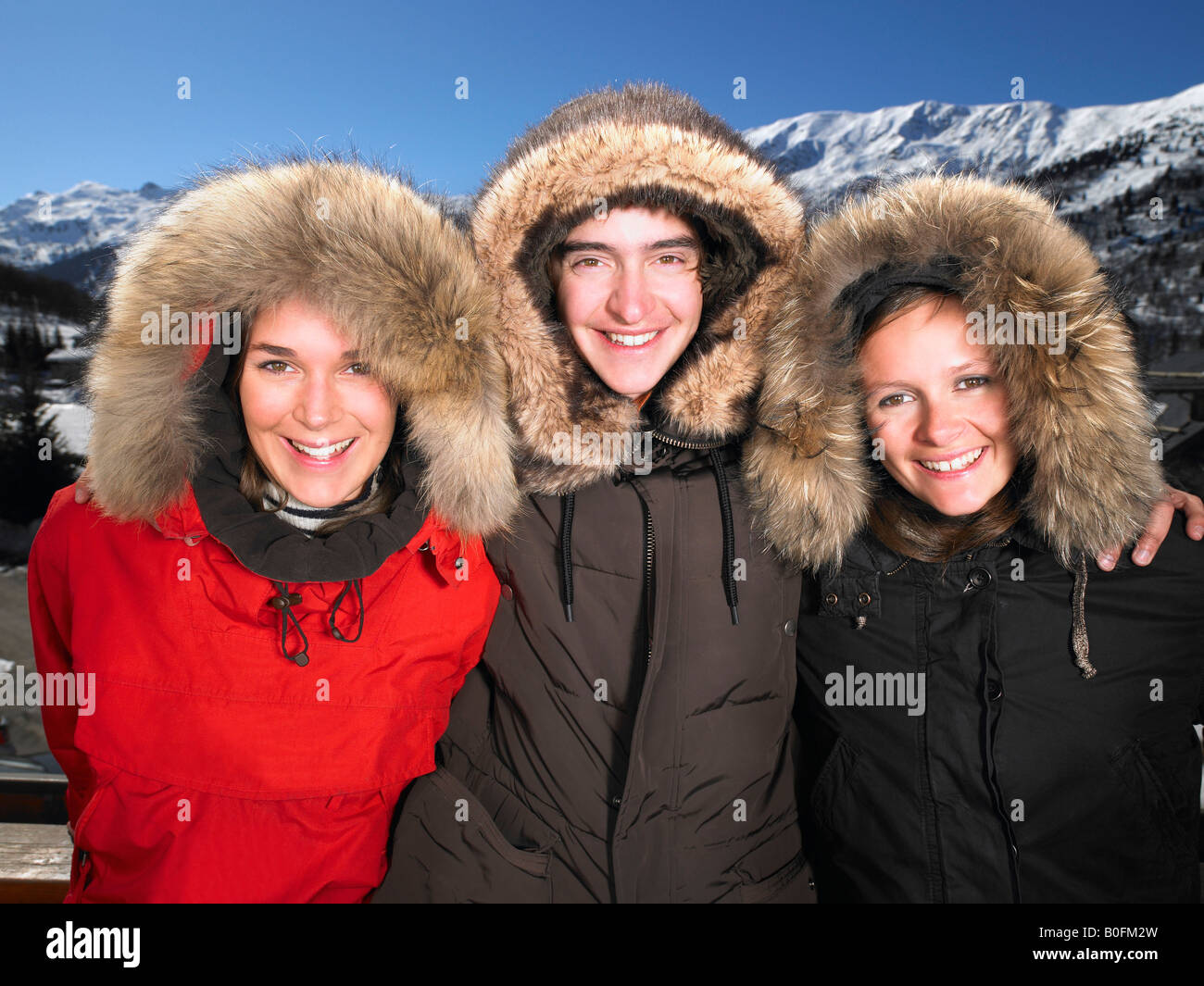 People wearing furry hooded jackets Stock Photo - Alamy