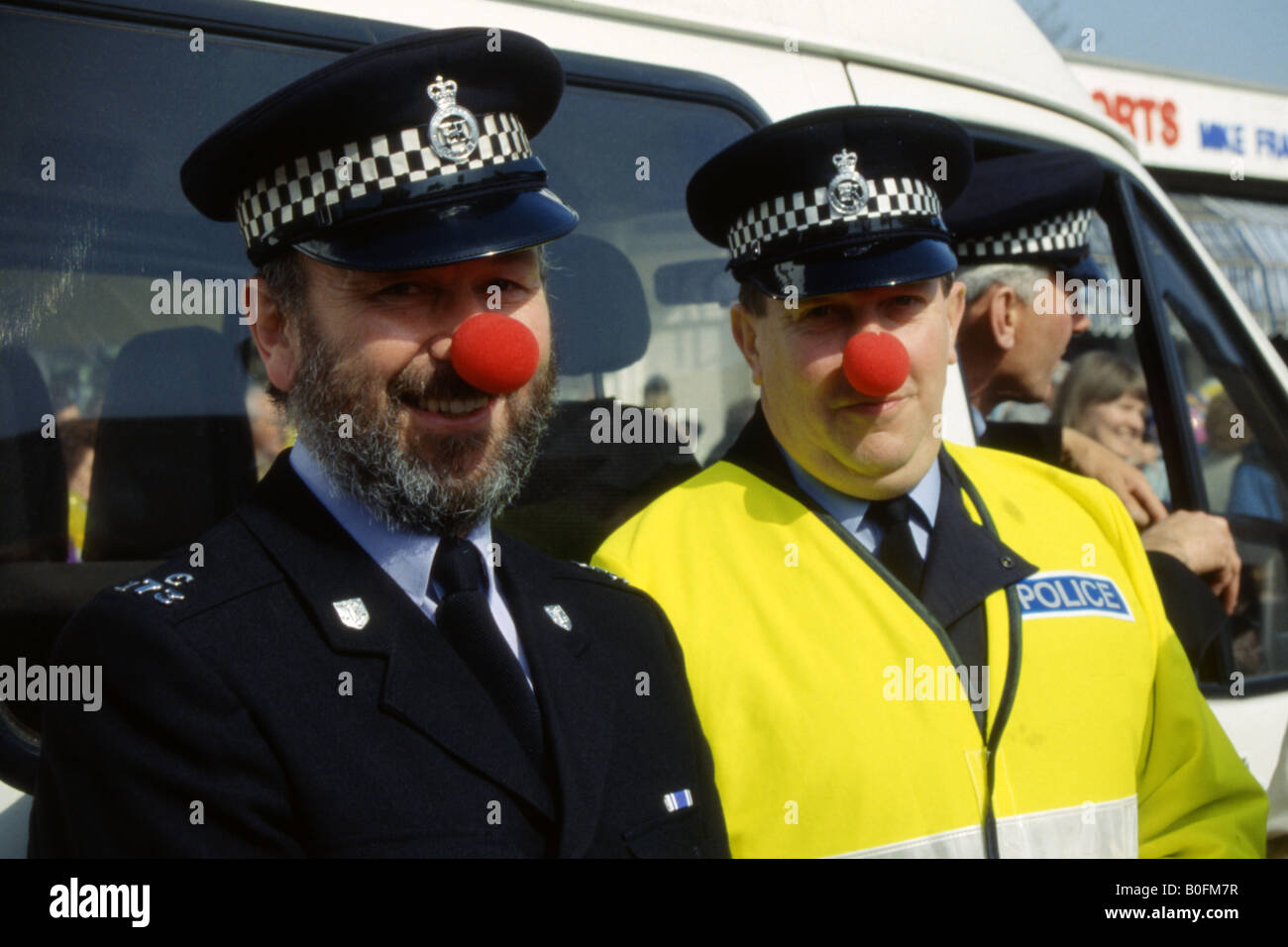 two-police-officers-with-red-noses-join-in-the-fun-at-the-last-clowns-B0FM7R.jpg