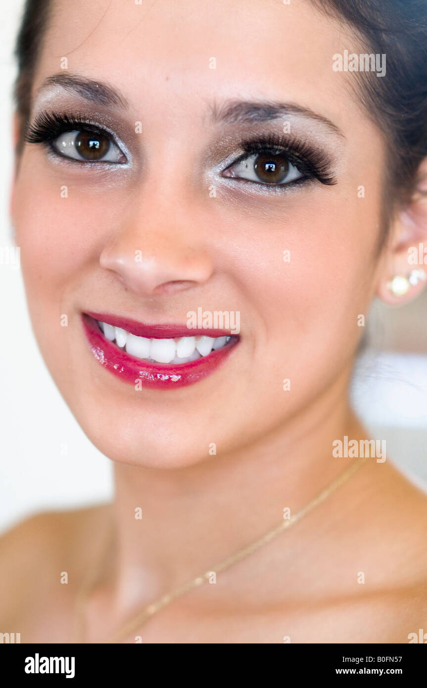 Beautiful young  girl in formal dress gown for high school prom night Stock Photo