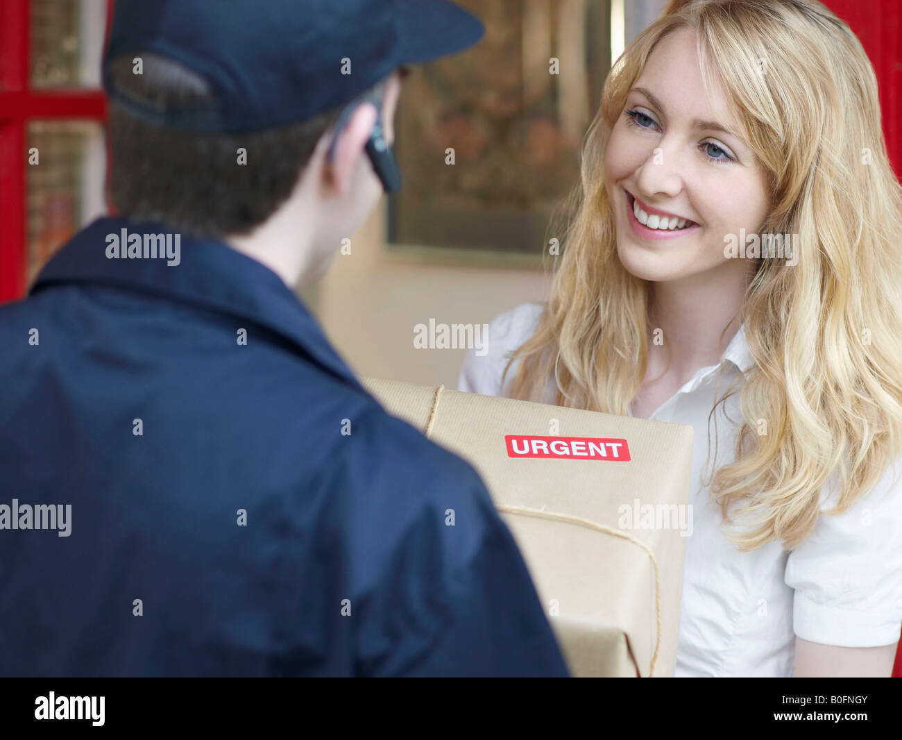 Woman receiving urgent delivery Stock Photo
