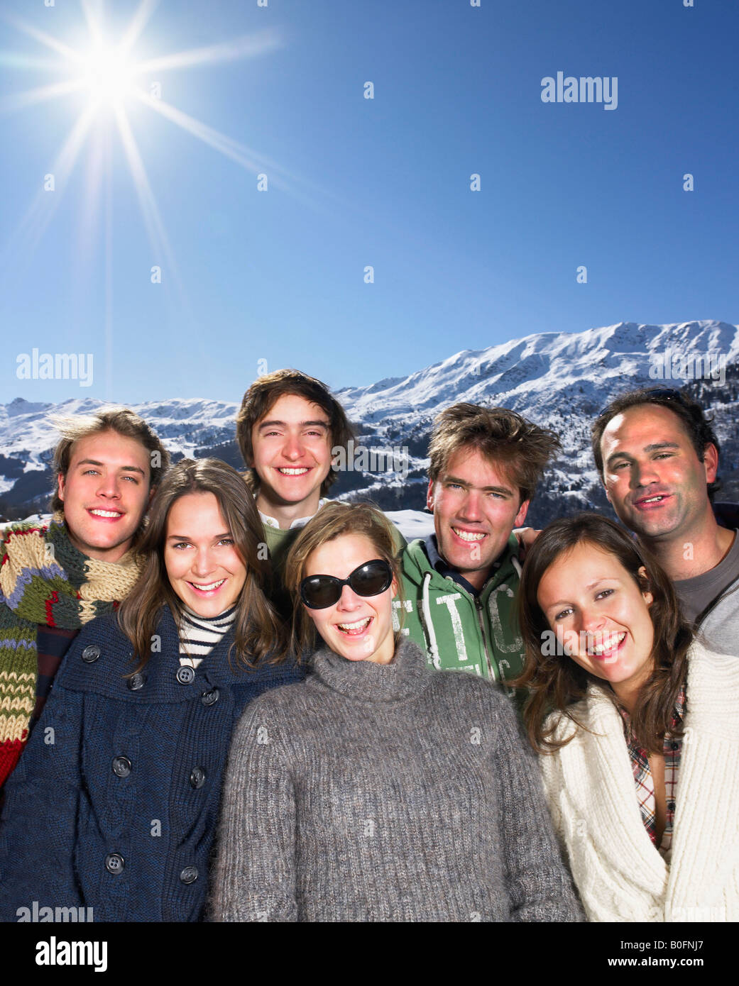 Smiling group at mountains Stock Photo