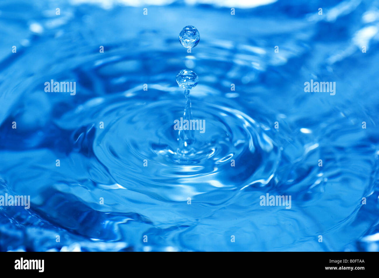 Water splash drop blue hi-res stock photography and images - Alamy