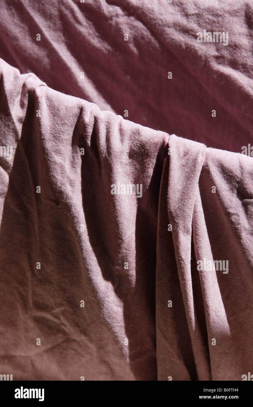 clean bedding sheets hanging on washing line Stock Photo Alamy