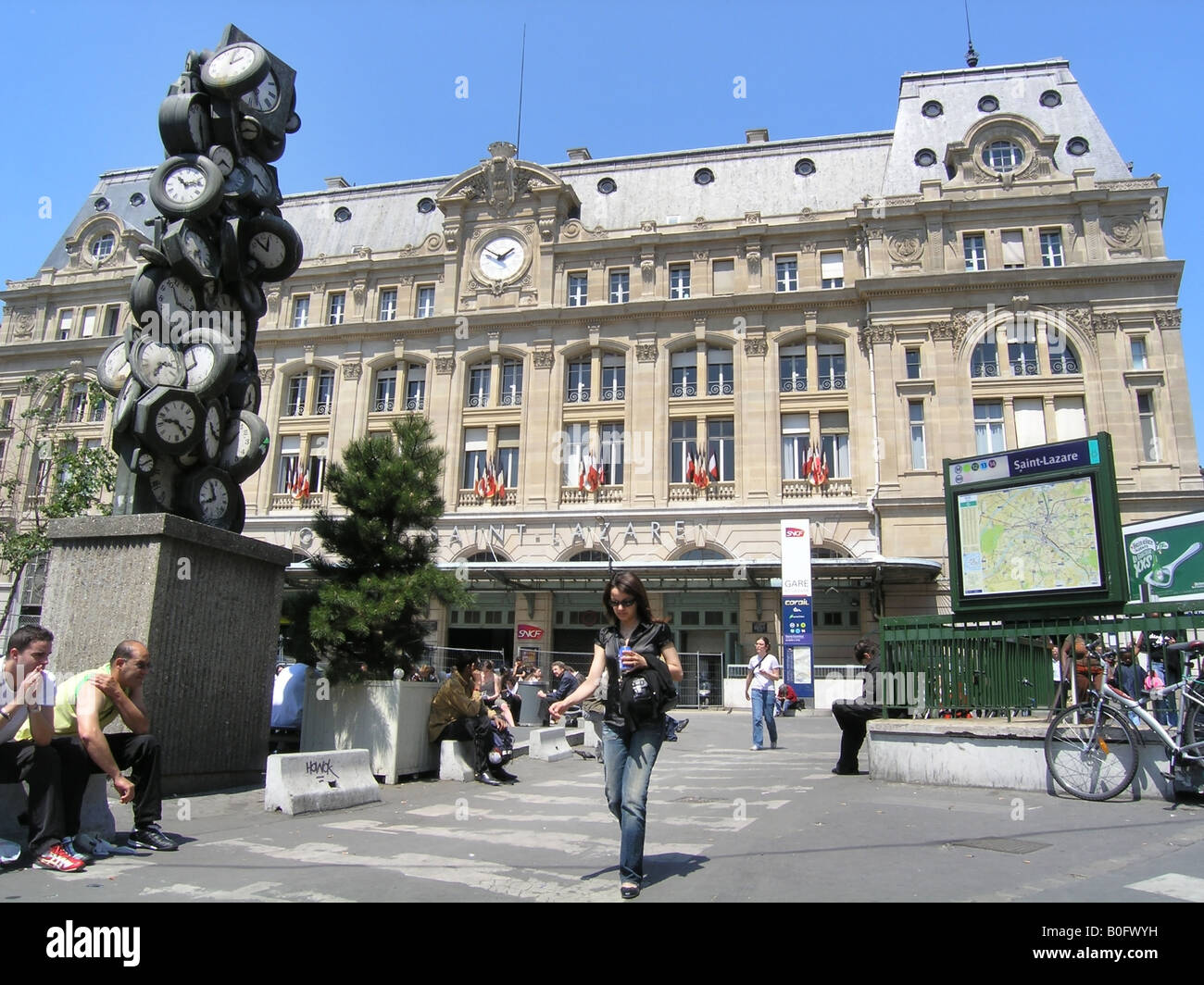 Gare St Lazare railway station with clock sculpture Paris France Stock