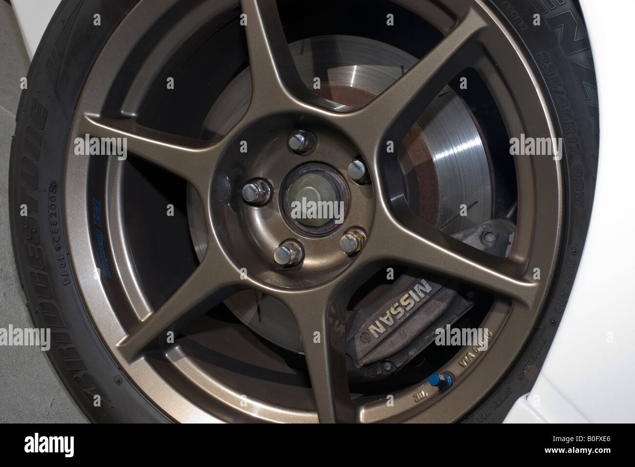 wheel brake caliper & disc on a modified Japanese import car Stock