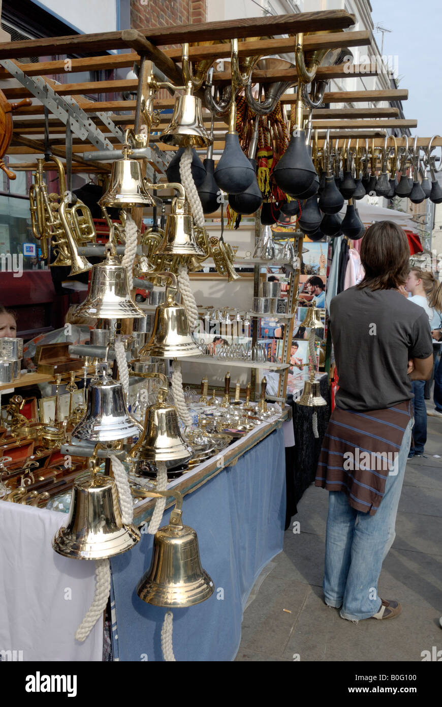 Horns and bells hanging at the Portobello road market Stock Photo