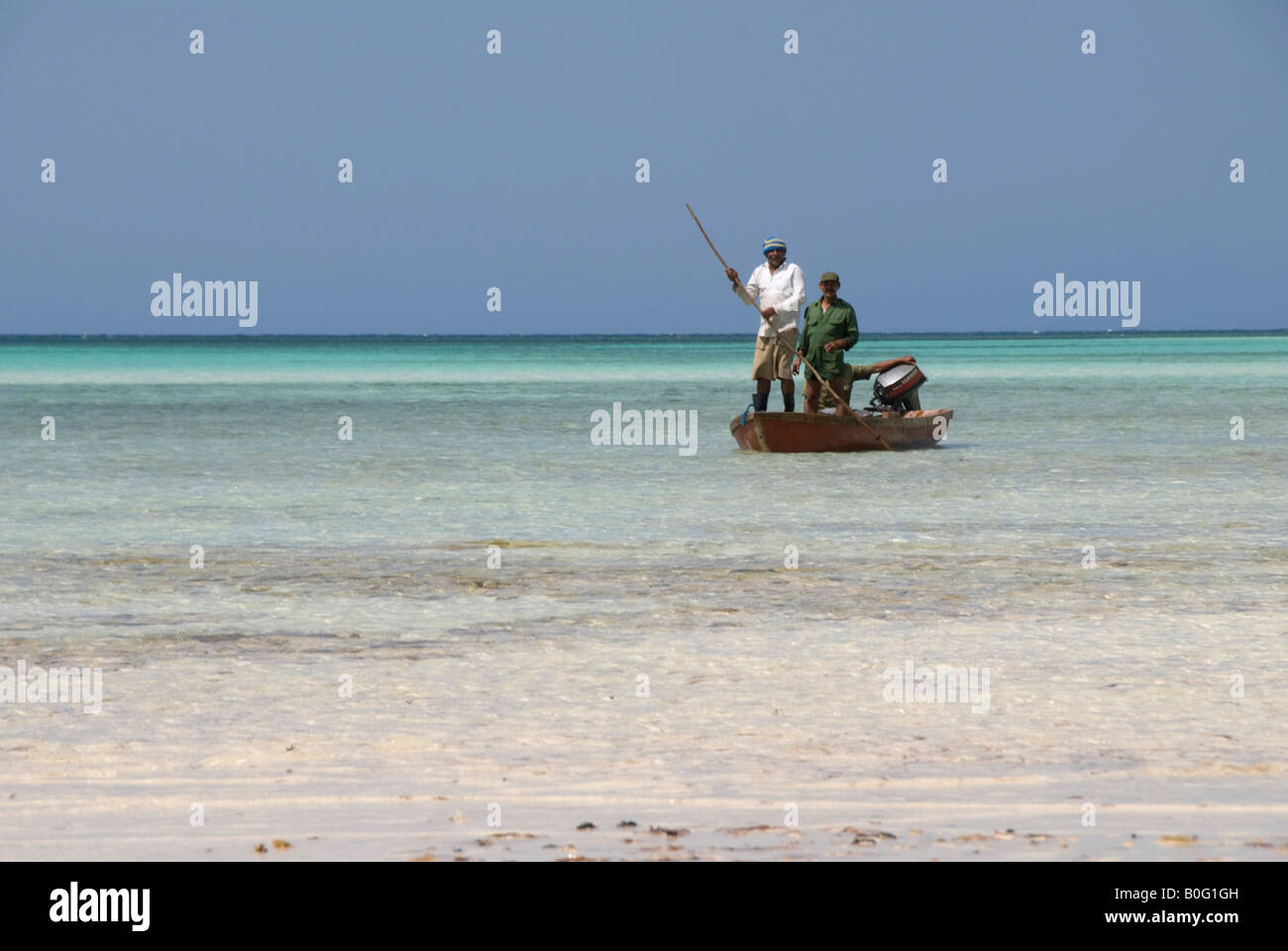 Cuban three fishermen on a boat Stock Photo