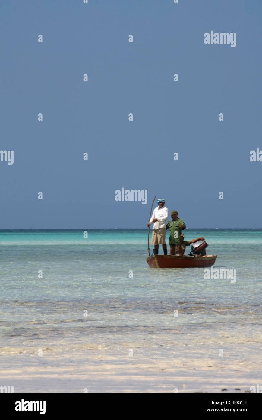 Cuban three fishermen on a boat Stock Photo