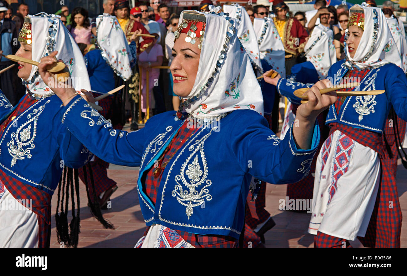 TURKISH YOUNG WOMEN  WEARING  TRADITIONAL CLOTHES AND PERFORMING DANCE AT MARMARIS MUGLA TURKEY DURING FESTIVAL OF YOUTH Stock Photo
