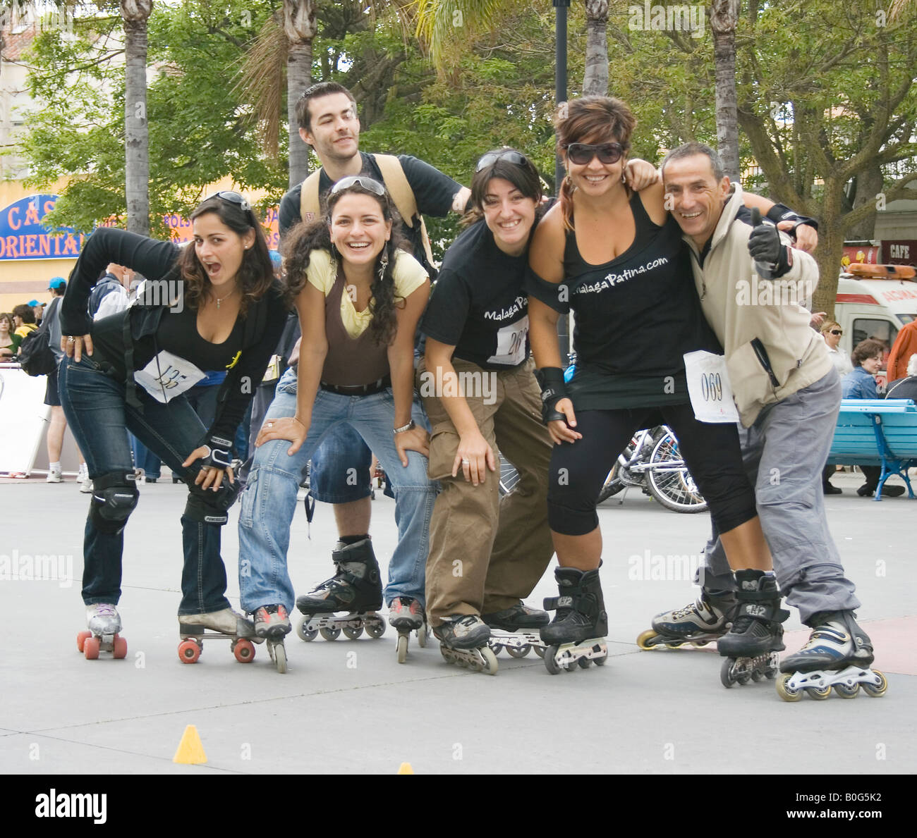 Group of young people wearing in line roller skates Stock Photo