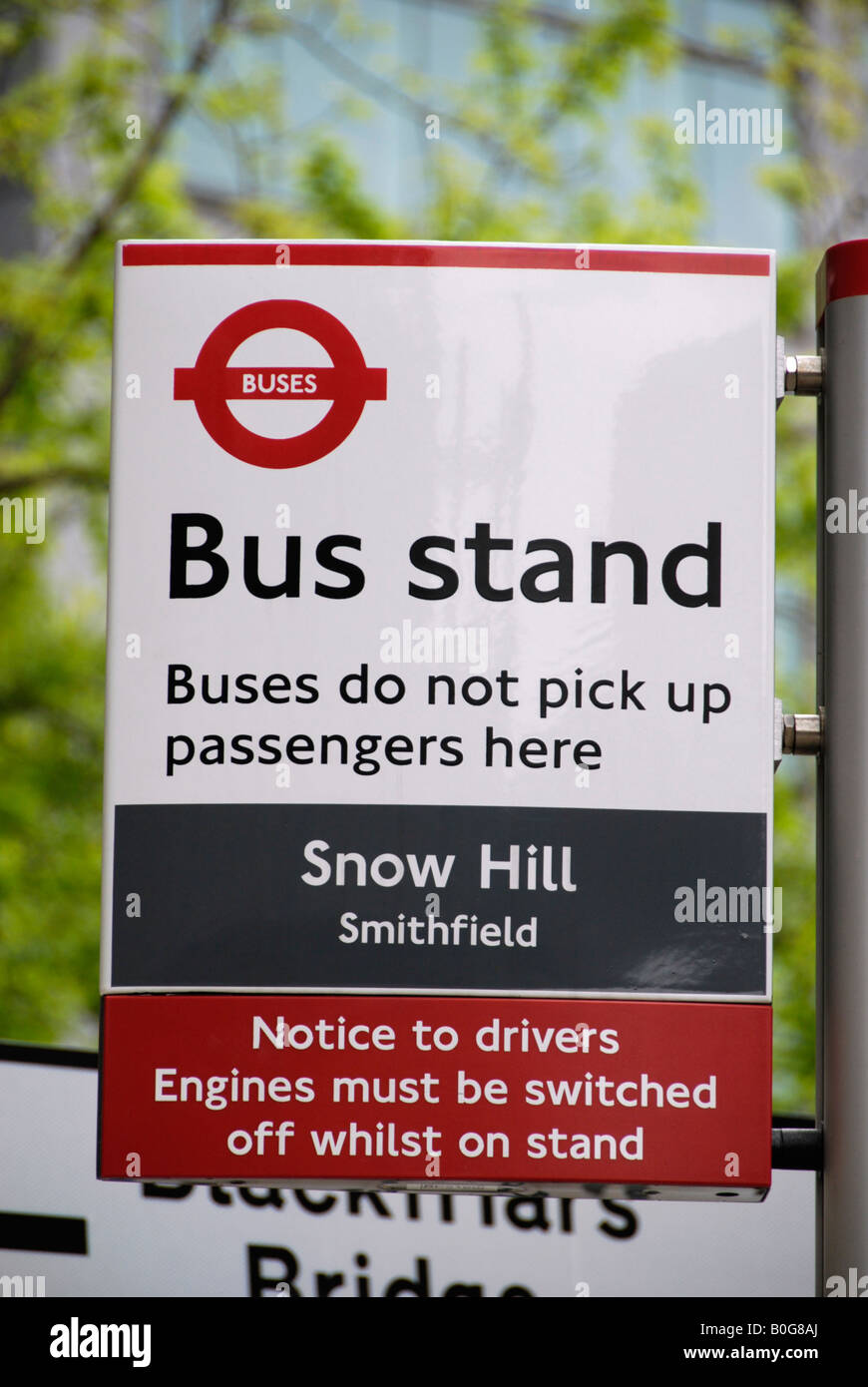 Bus stand sign reading Buses do not pick up passengers here in Snow Hill Smithfield London EC1 UK Stock Photo