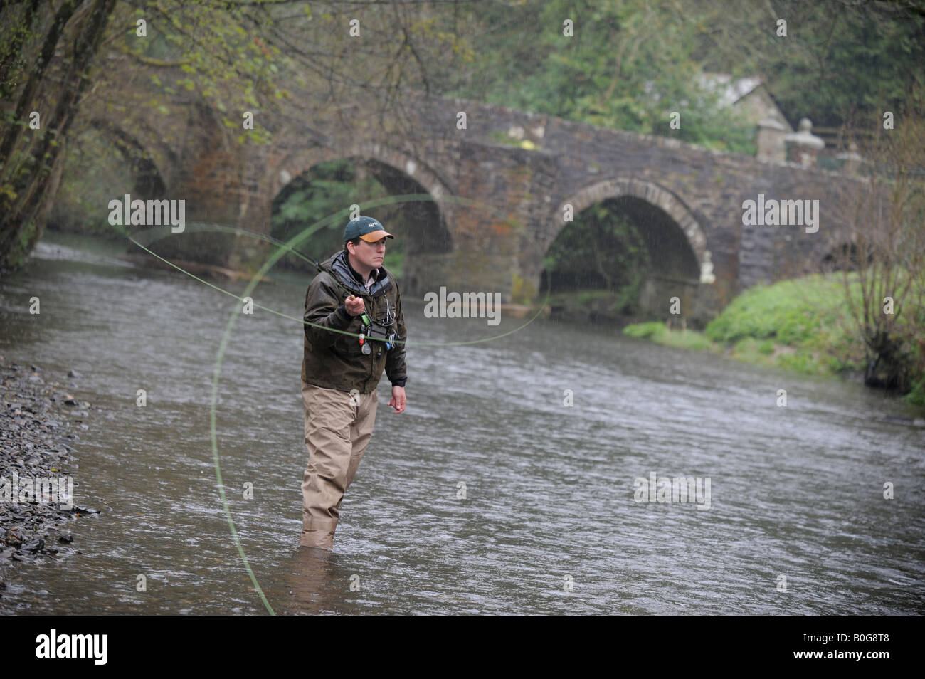 Picture By Jim Wileman 22 04 2008 Fly fishing on the river Lyd with Anne Voss Bark and FT reporter Bob Sherwood Stock Photo