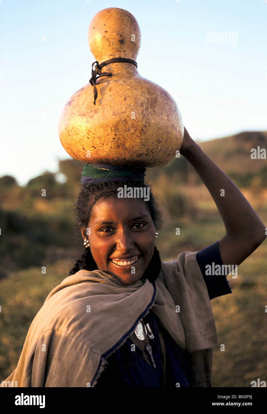 A woman fetching water in a gourd, Gonder, Ethiopia. Stock Photo