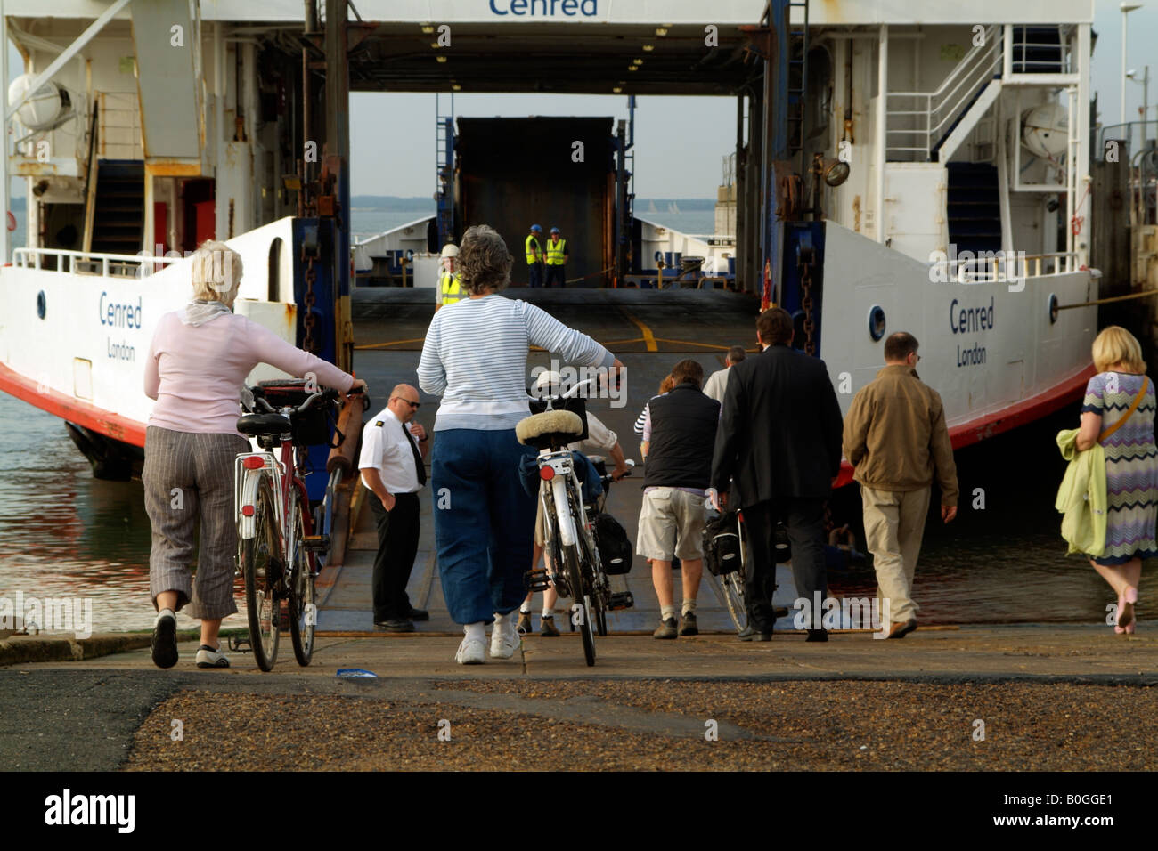 Cyclists and Foot Passengers Boarding RoRo ferry of Wightlink Company at Yarmouth Isle of Wight England UK Stock Photo