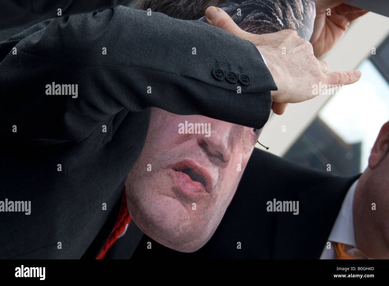 someone in a gordon brown mask at a protest against expanding aviation Stock Photo