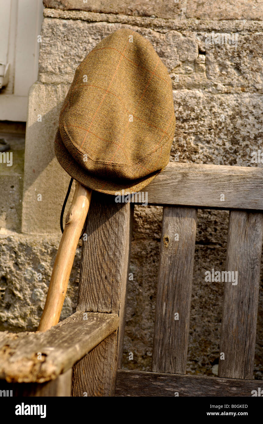 A countryman's cap and walking stick England Stock Photo Alamy