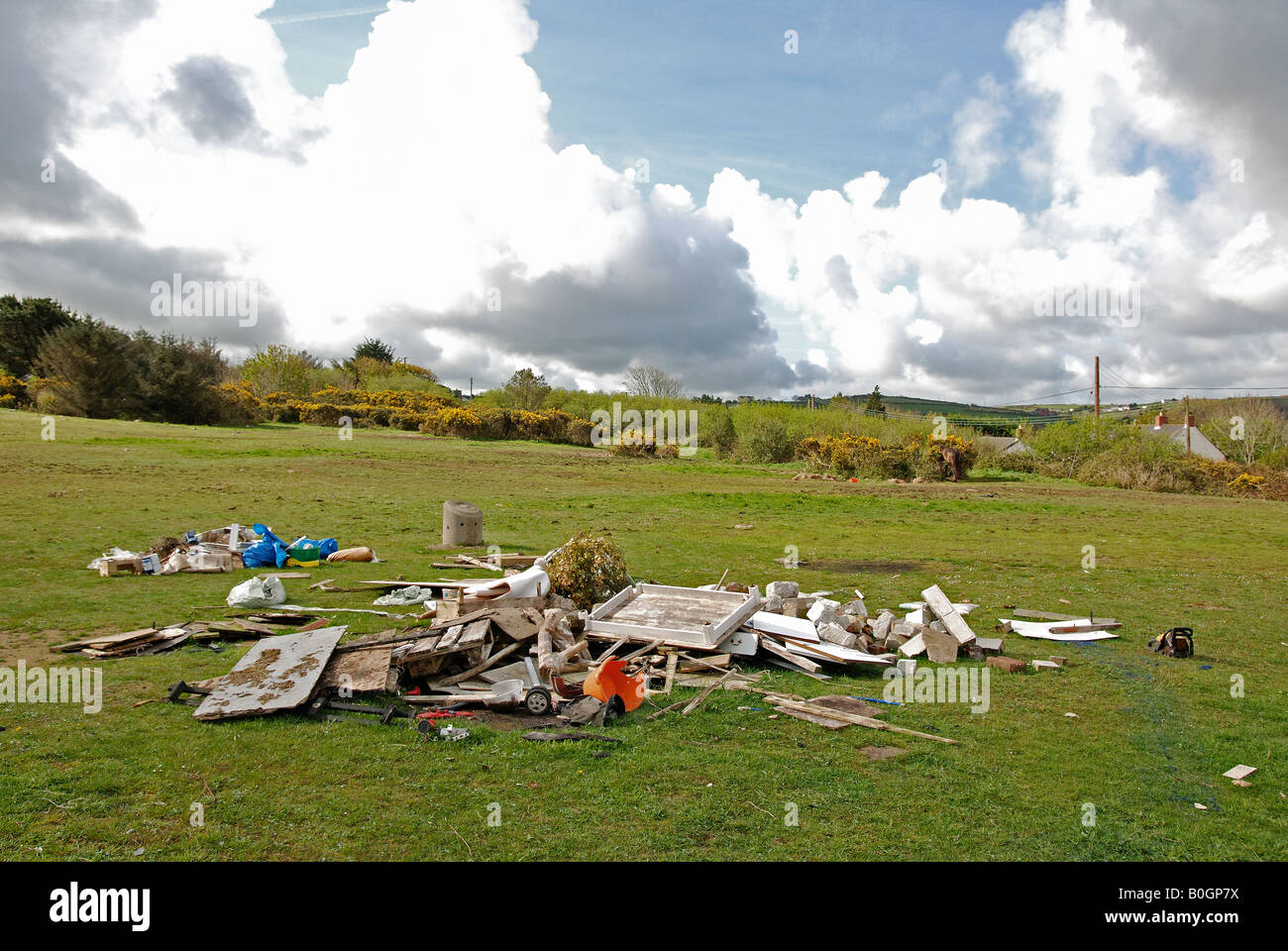 fly tipping near redruth in the cornish countryside Stock Photo