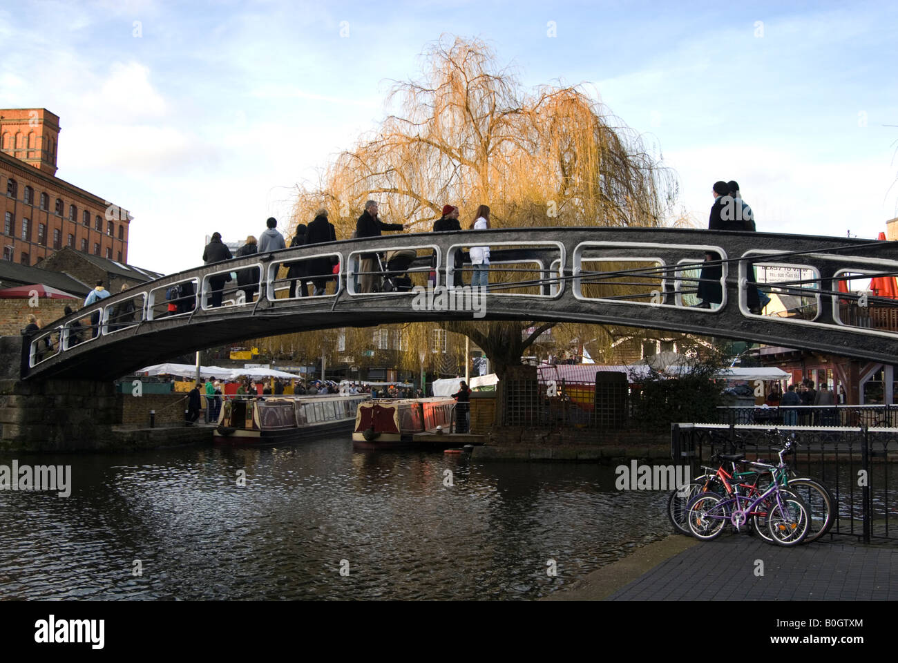 Cast iron bridge spanning canal at Camden Market London England, UK Stock Photo
