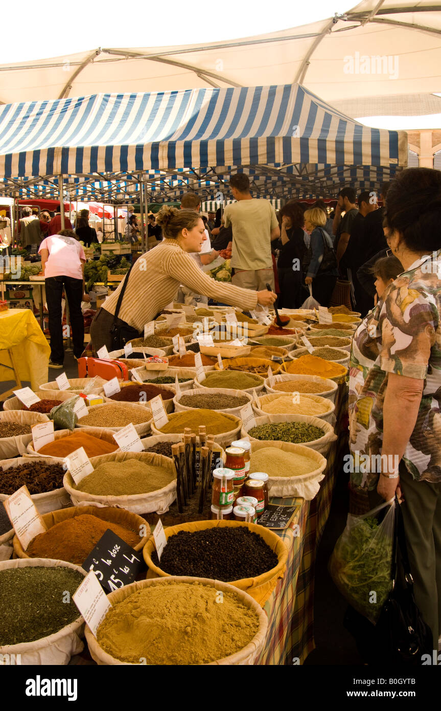 Celine Chiaradia selling spice in market in Moissac Stock Photo