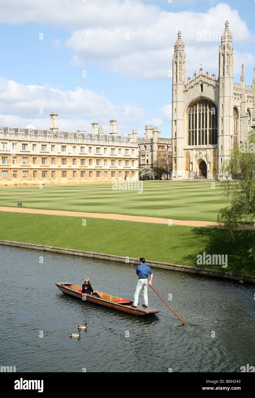 A couple punting past Kings College Chapel and Clare College, Cambridge UK Stock Photo