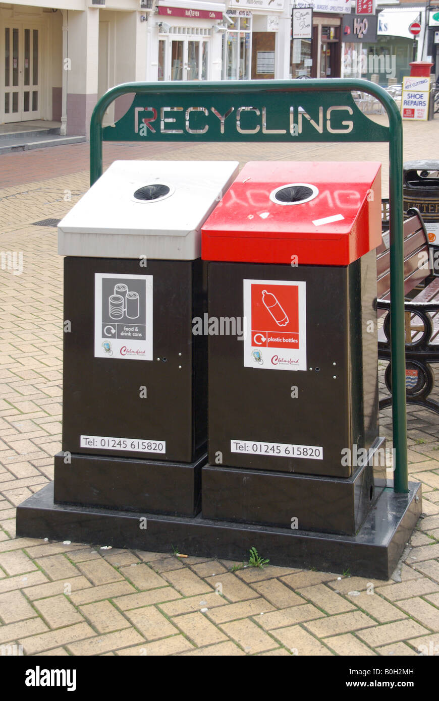 Litter bins for cans and plastic bottles located in pedestrianised shopping high street Stock Photo