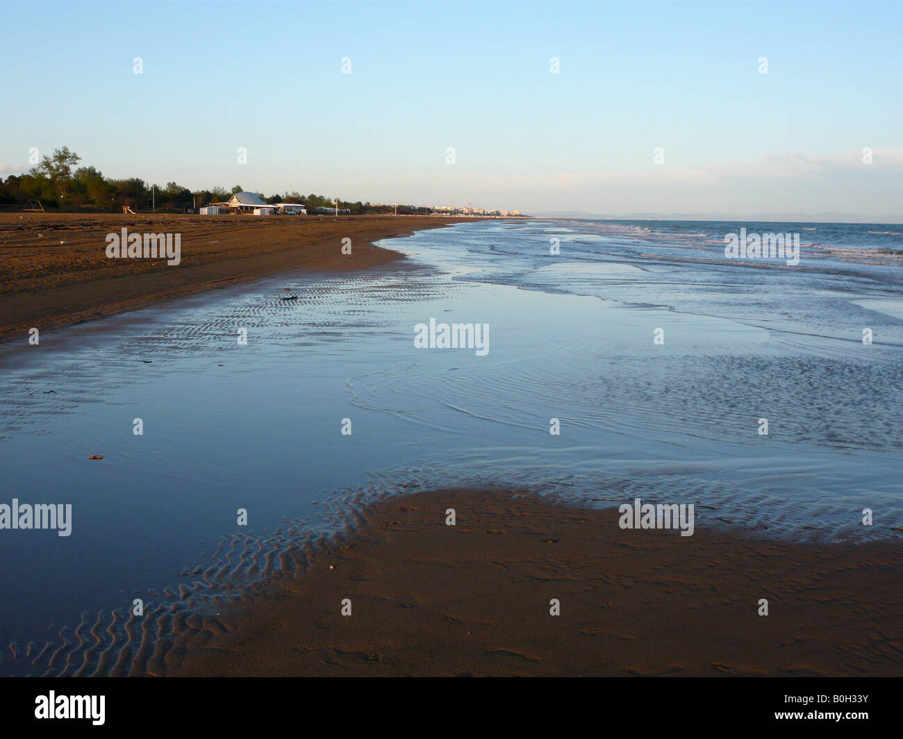 Evening at the beach of Bibione Pineda in late April before the start of the season. Stock Photo