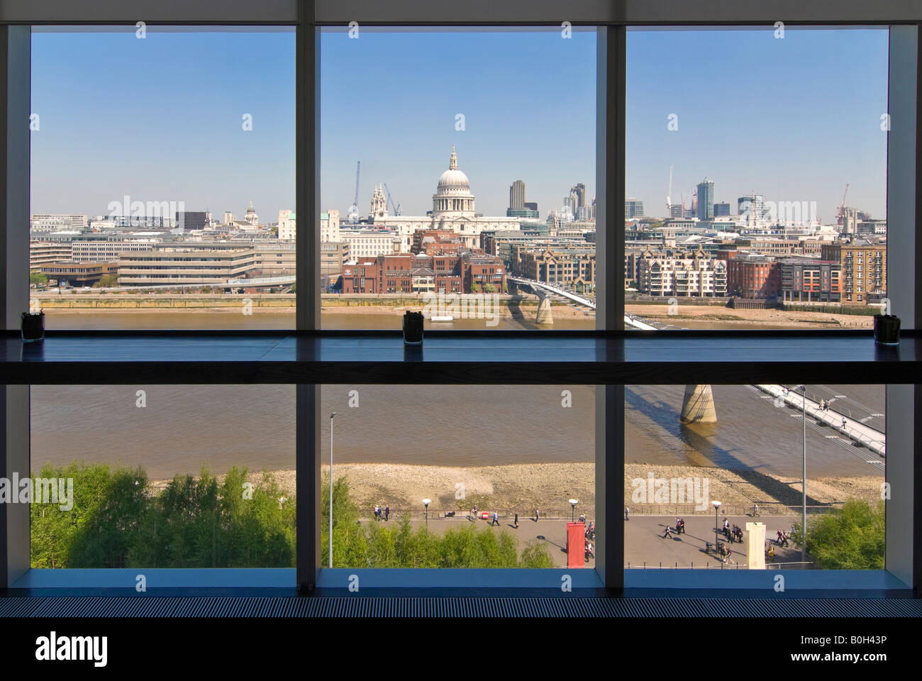 Horizontal aerial view over the river Thames towards Ludgate and St Paul's Cathedral on a bright sunny day. Stock Photo