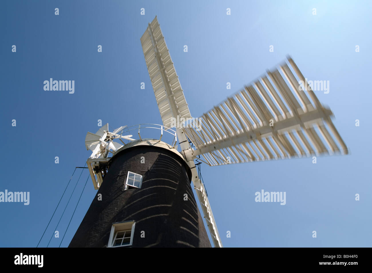 A working windmill seen against the blue sky, Swaffham Prior, Cambridgeshire, England Stock Photo
