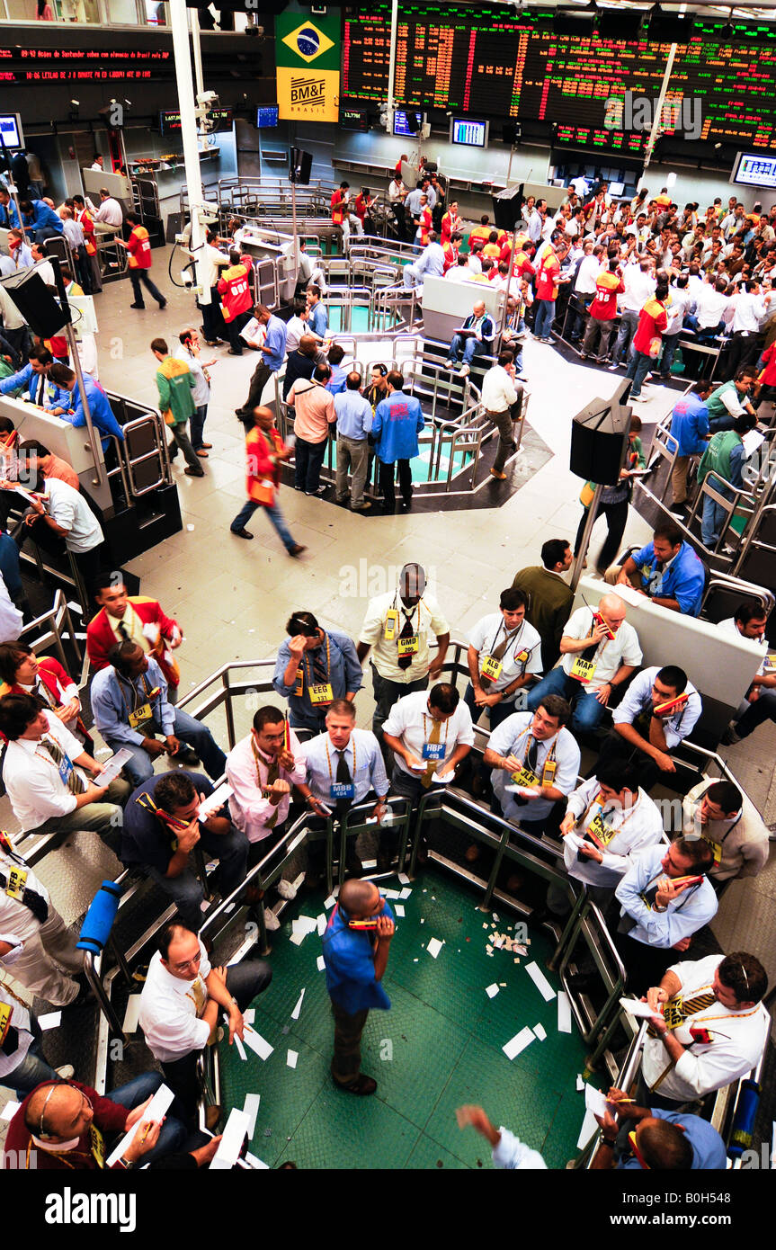 Traders signal orders at the Brazilian Bolsa de Mercadorias e Futuros or Brazilian Mercantile and Futures Exchange BM F Stock Photo