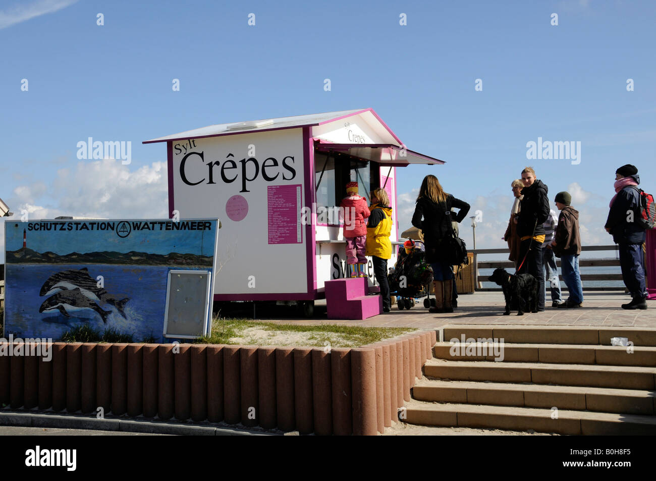 Tourists and locals queuing up at a crepes stand in Hoernum on the North Frisian island of Sylt, Schleswig-Holstein, Germany Stock Photo