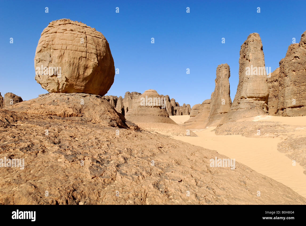 Eroded rock formations in Tin Akachaker, Tassili du Hoggar, Wilaya Tamanrasset, Algeria, North Africa Stock Photo