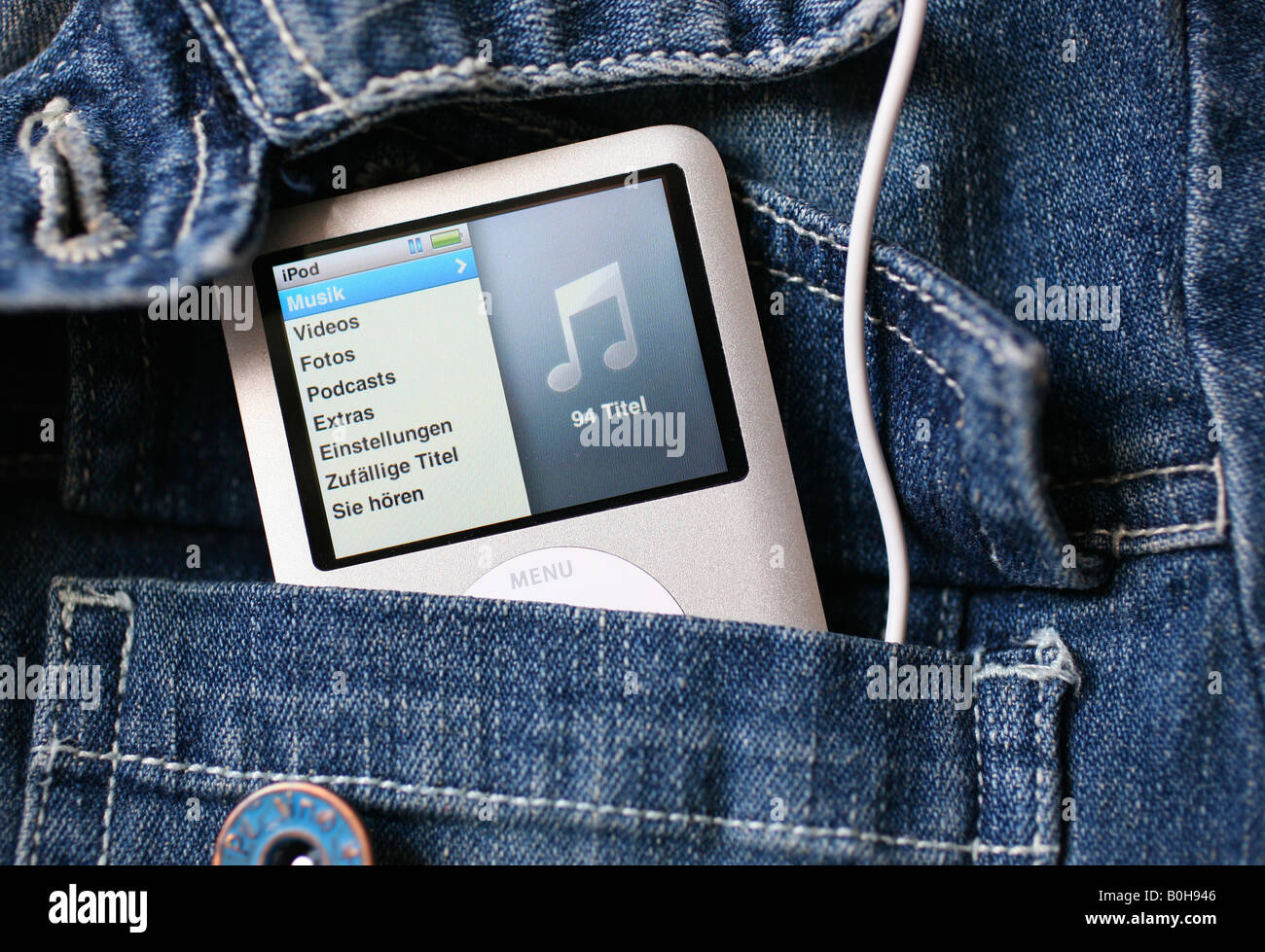 Apple iPod Nano in a jeans back pocket Stock Photo