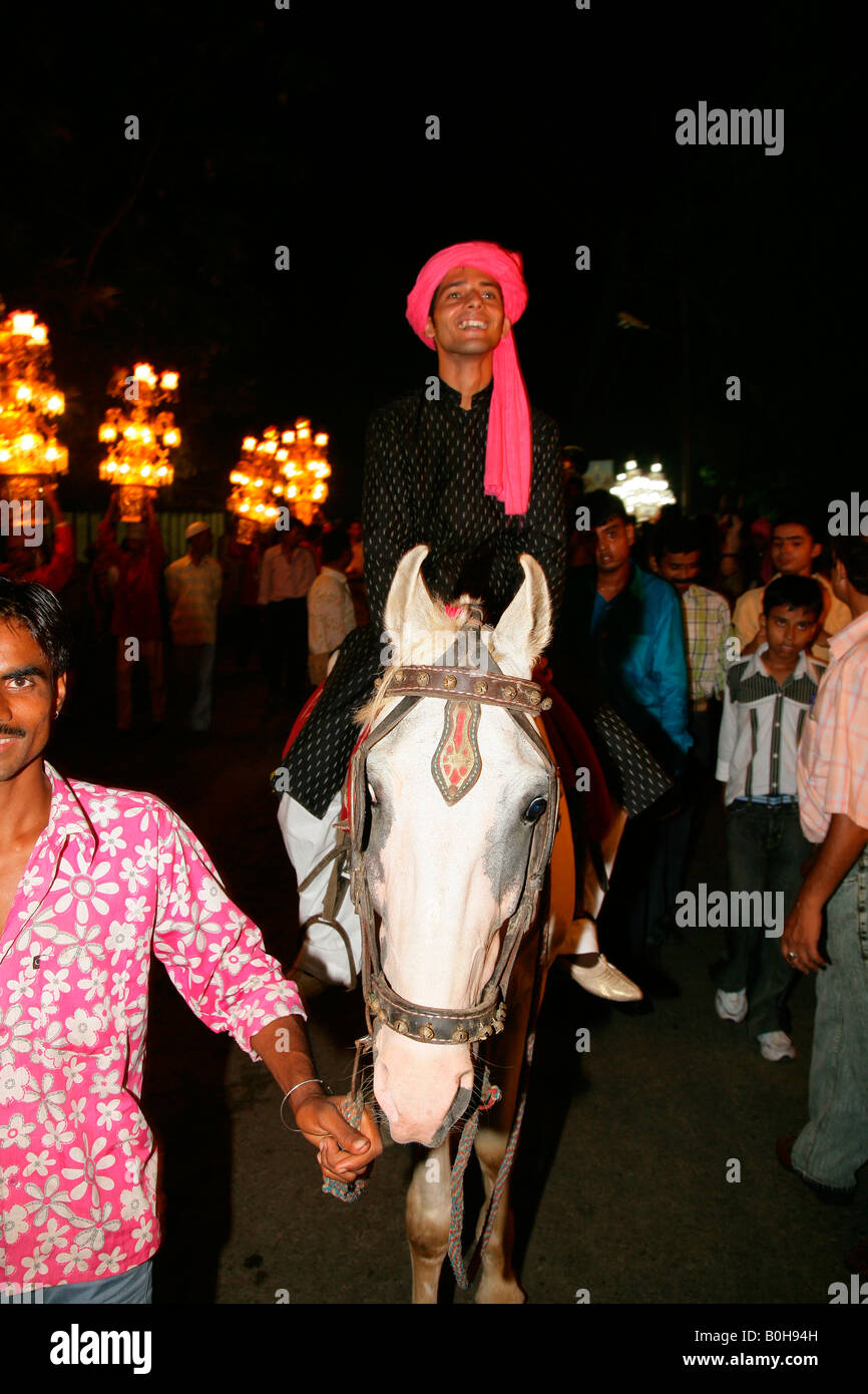 Man riding horse during a wedding held at a Sufi shrine, Bareilly, Uttar Pradesh, India, Asia Stock Photo