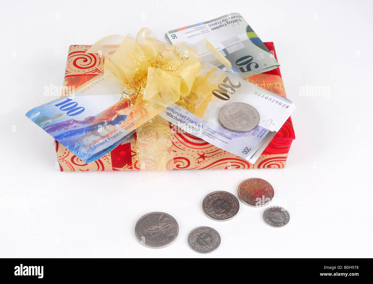 Swiss Francs on a wrapped present Stock Photo