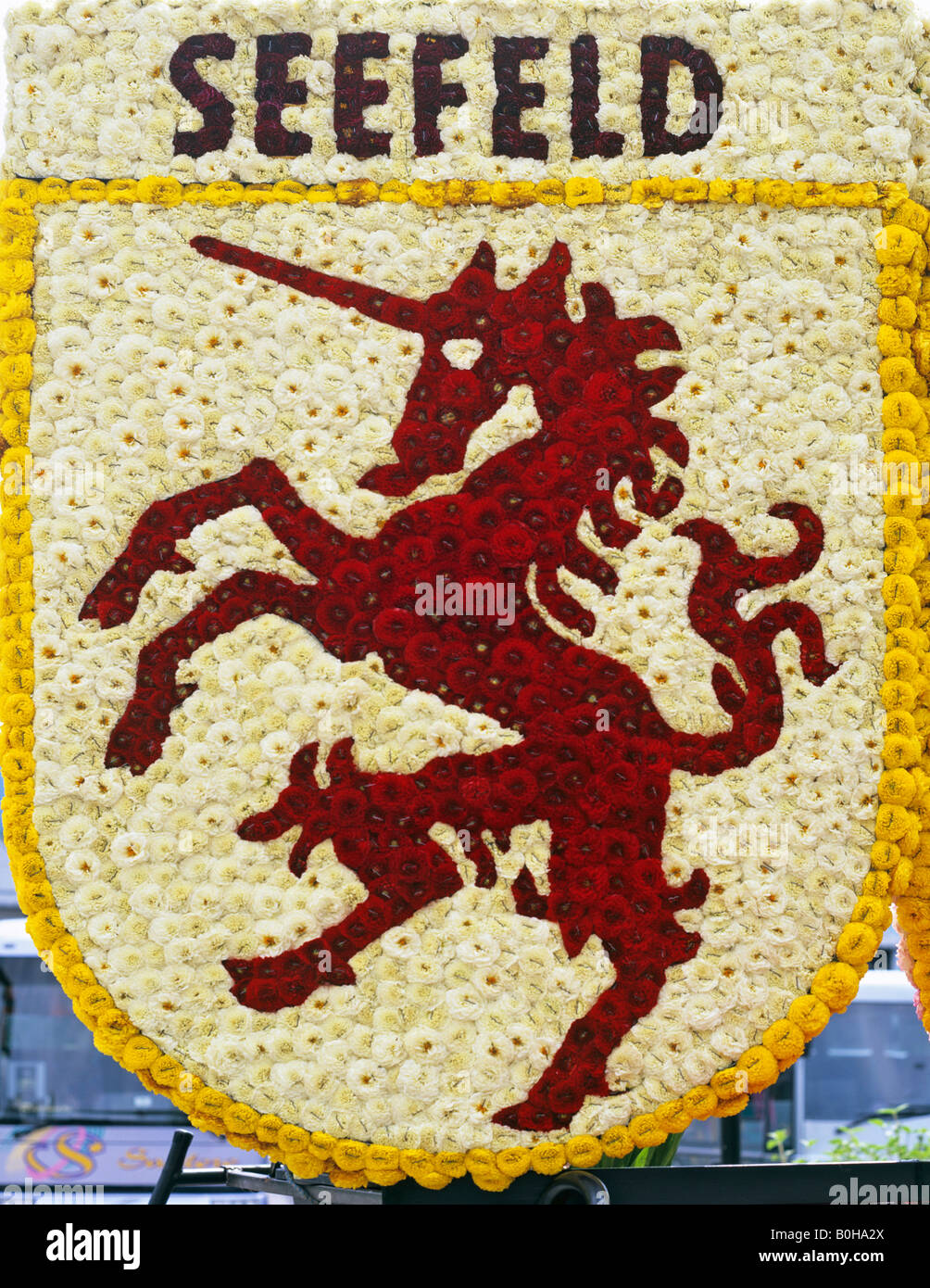 Seefeld coat of arms made of flowers featuring unicorn, Tirol, Austria Stock Photo