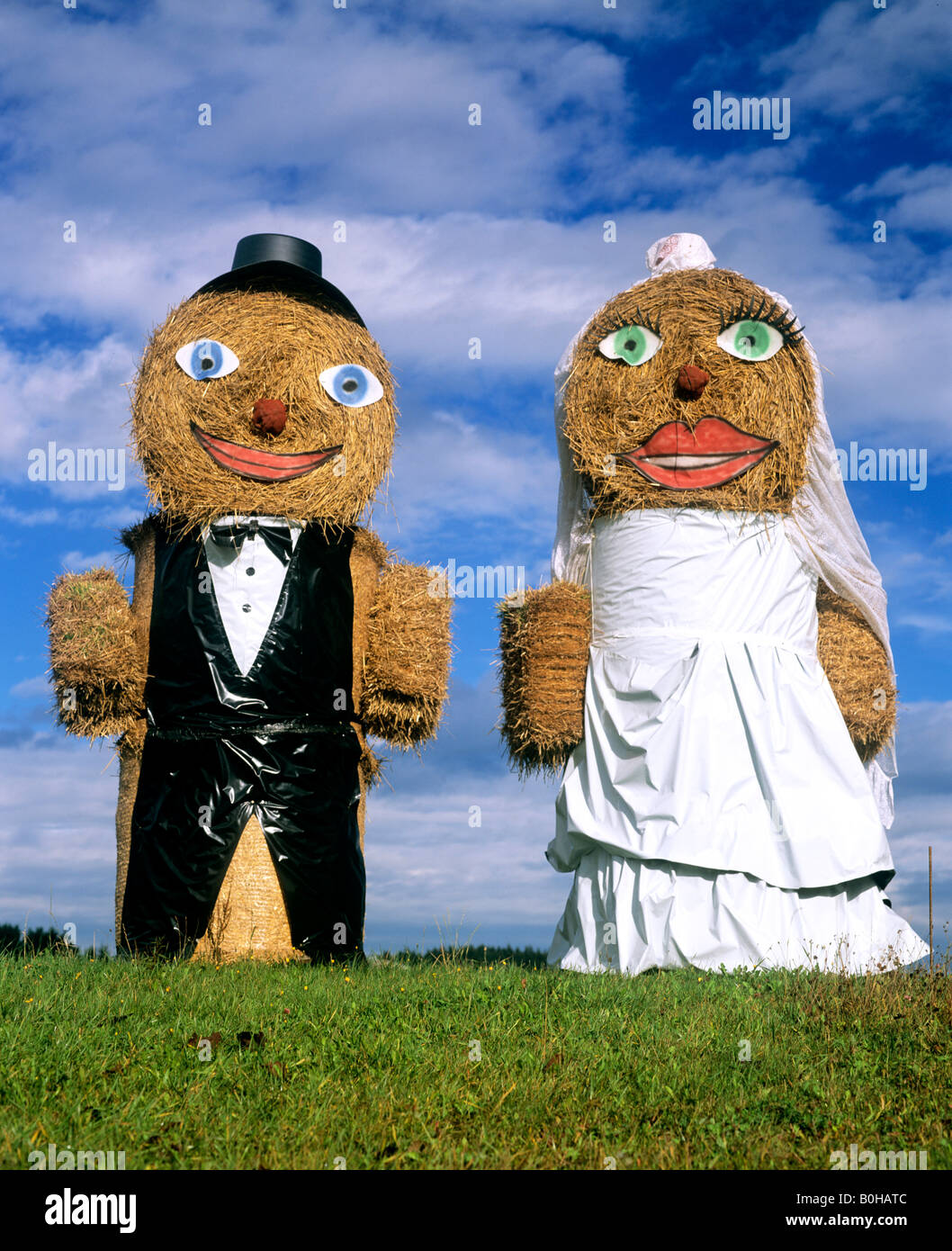 Bridal couple made out of bales of straw, wedding, Upper Bavaria, Bavaria, Germany Stock Photo