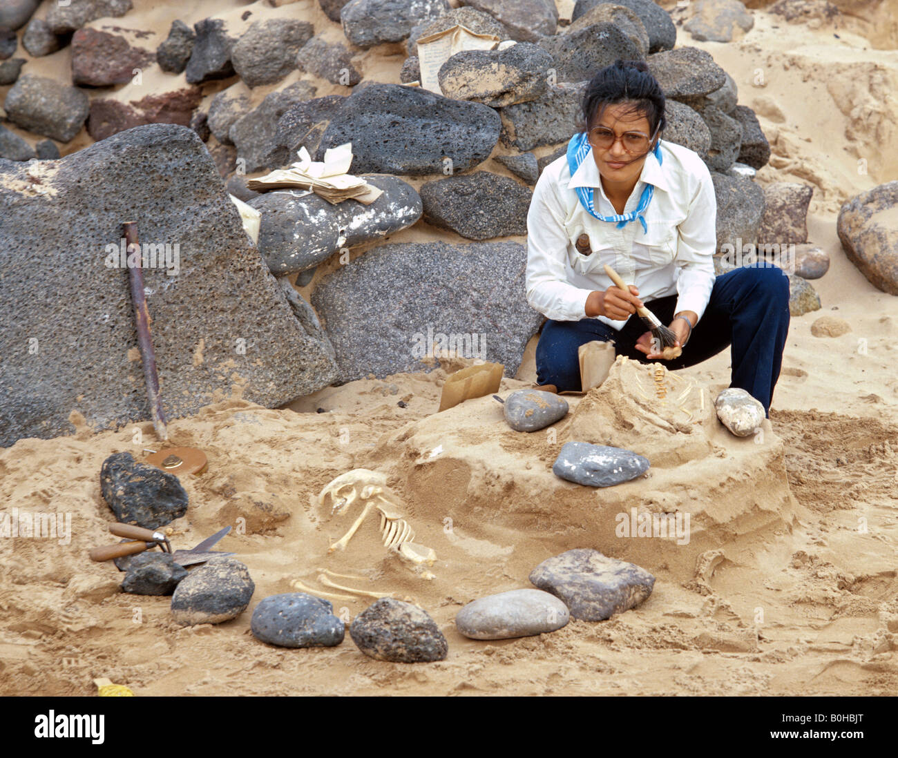 Archaeologist in front of a burial site, child's skeleton, excavation, Rapa Nui, Easter Island, Chile, Oceania Stock Photo