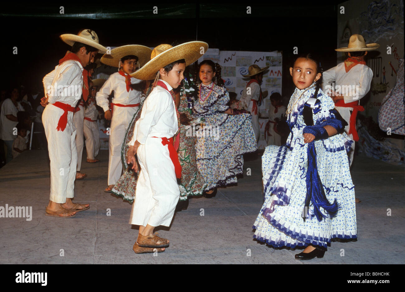 Children wearing folk dresses dancing traditional folklore dances, Guadalajara, Jalisco, Mexico Stock Photo