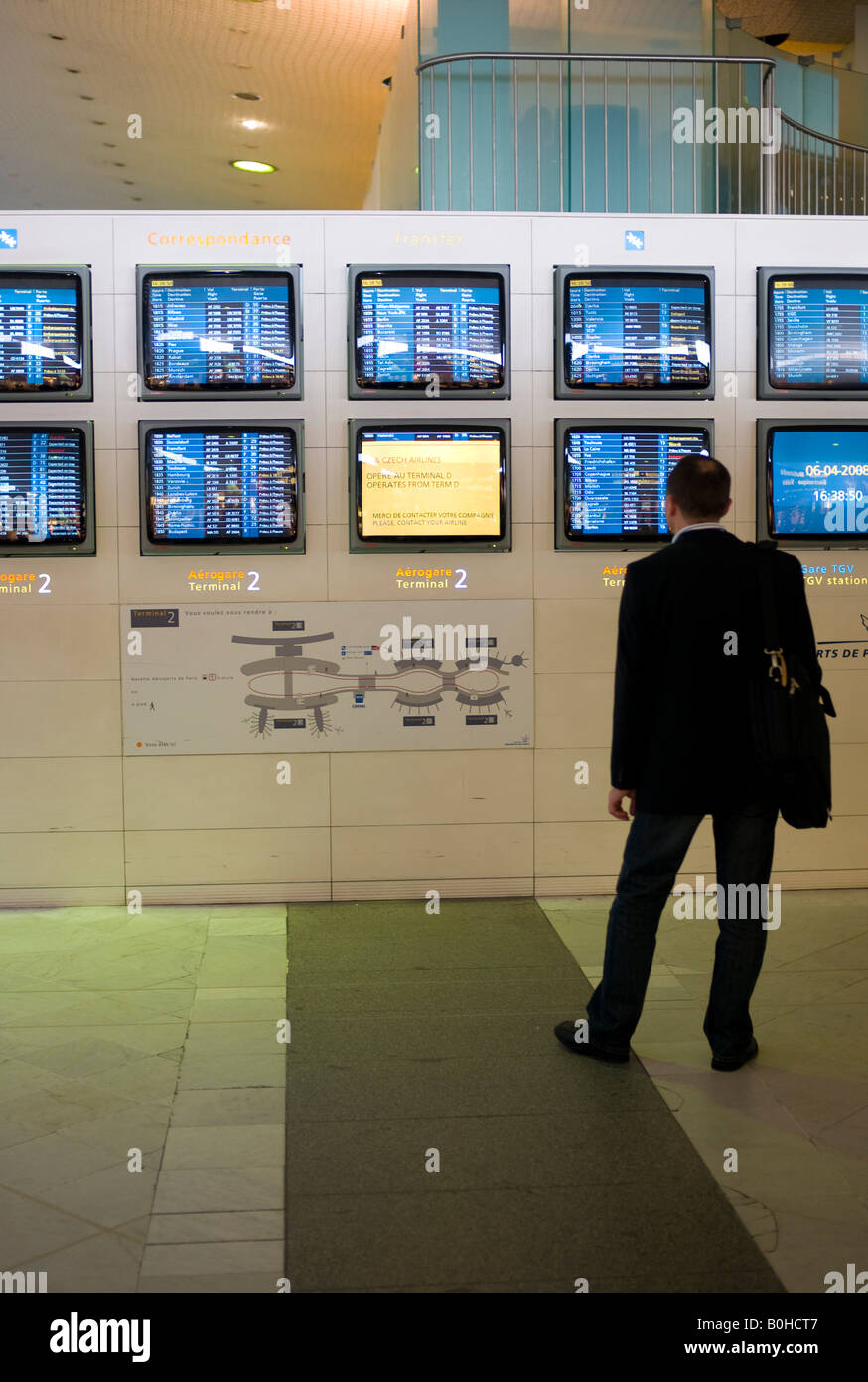 Flight information screens in Terminal 2, Charles de Gaulle International Airport, Paris, France, Europe Stock Photo